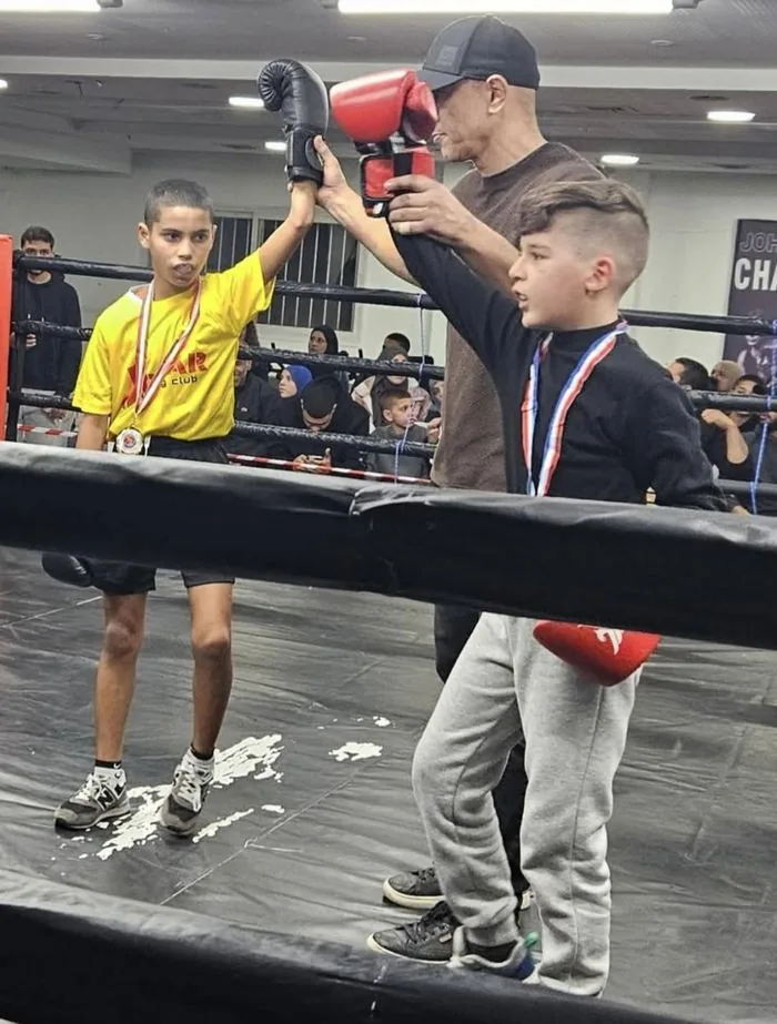Victory Hand Raised High